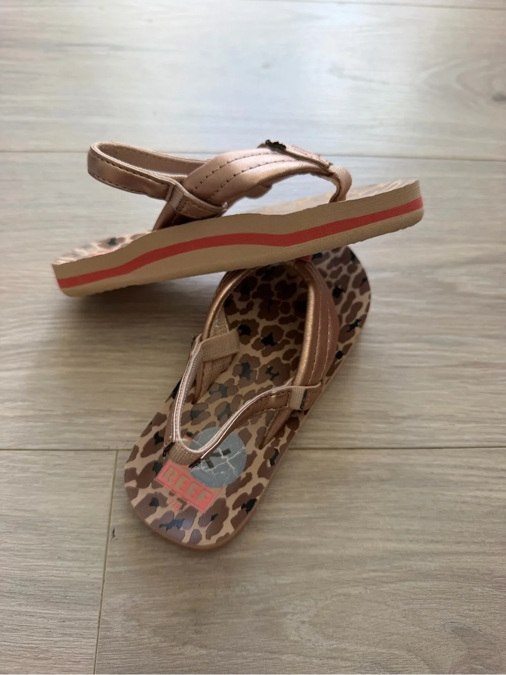 Reef Brown Leopard Print Flip Flops with Metallic Bronze Straps